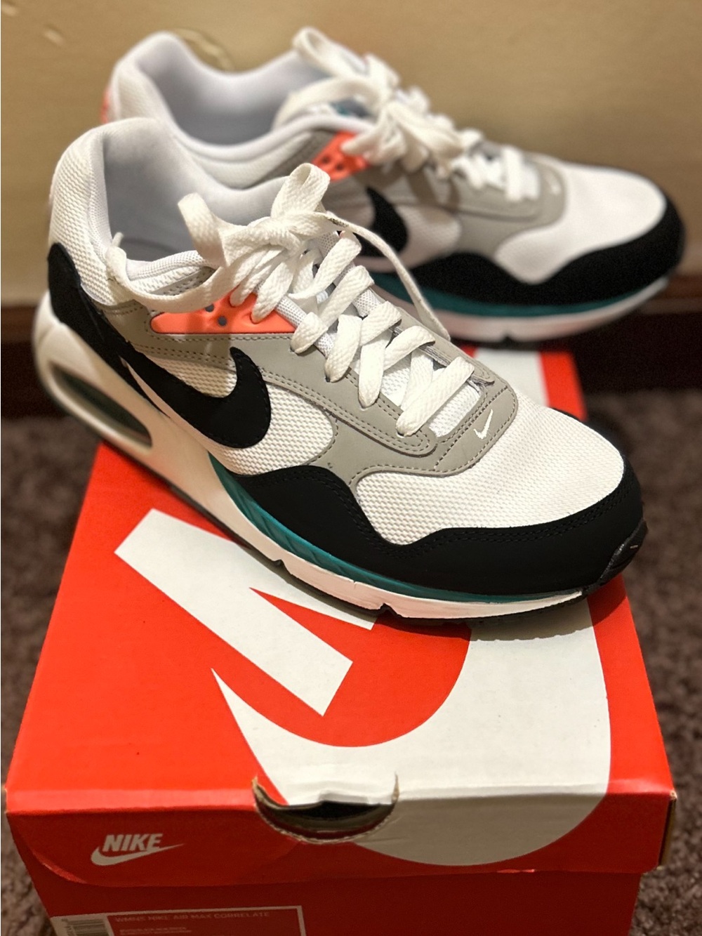 Nike Men’s White/Black/Gray Sneakers with Teal and Orange Accents